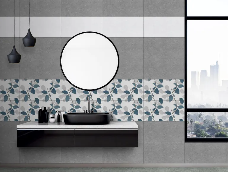 Chic grey bathroom design with matte black sink, mirror and window for added light